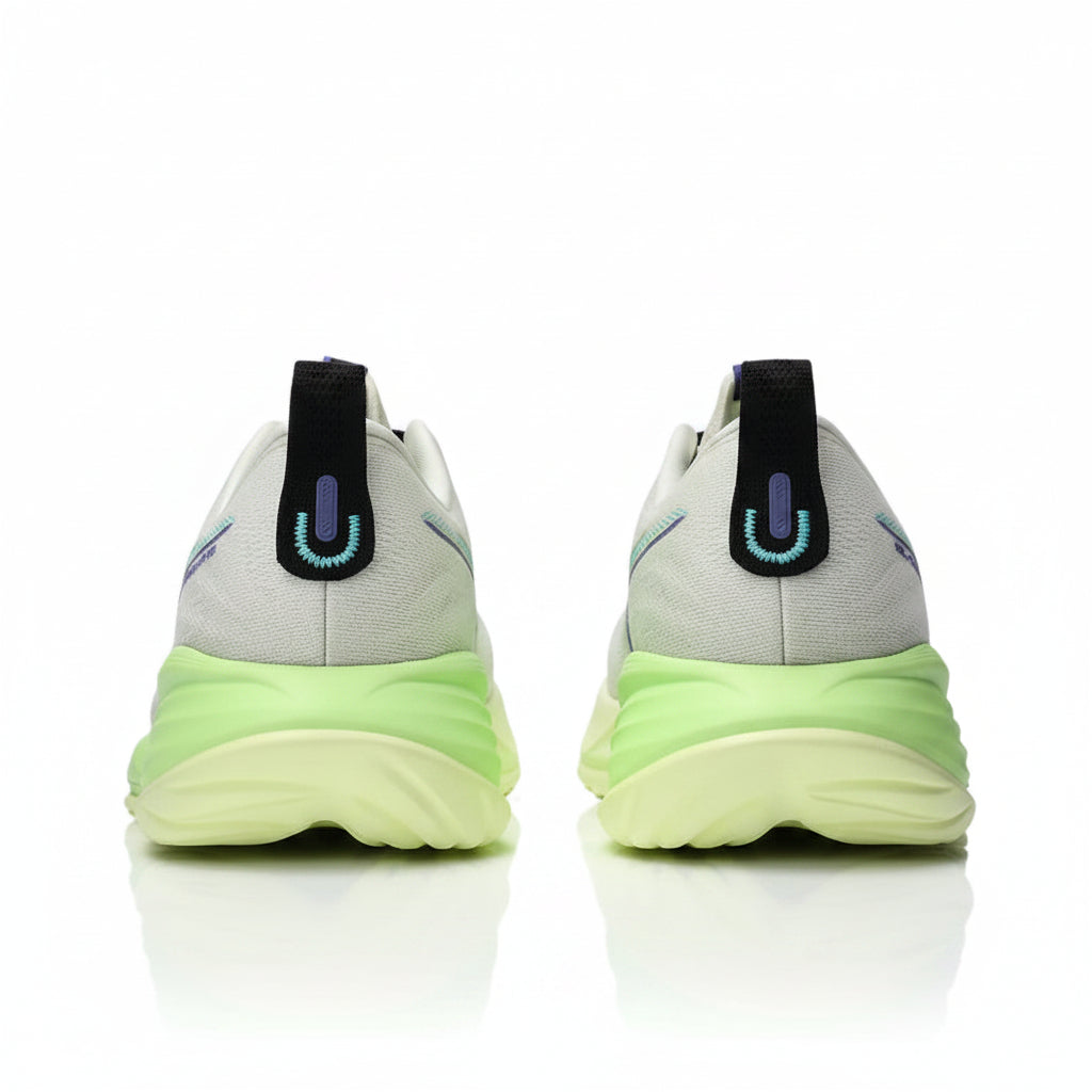 Pair of sneakers showing the sole and brand logo on a white background