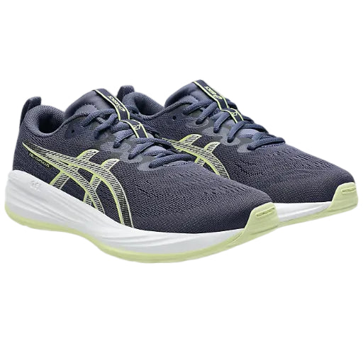 Pair of blue running shoes with white soles on a white background