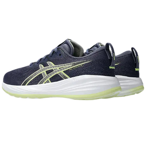 Navy running shoe with white sole and green accents on a white background