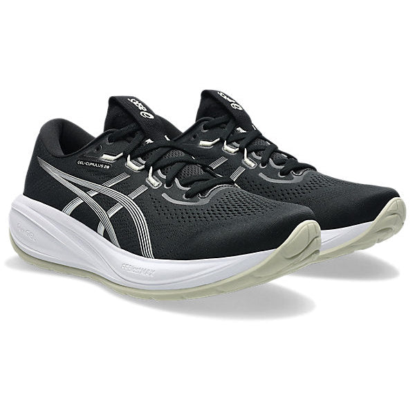 Black running shoes with white soles on a white background