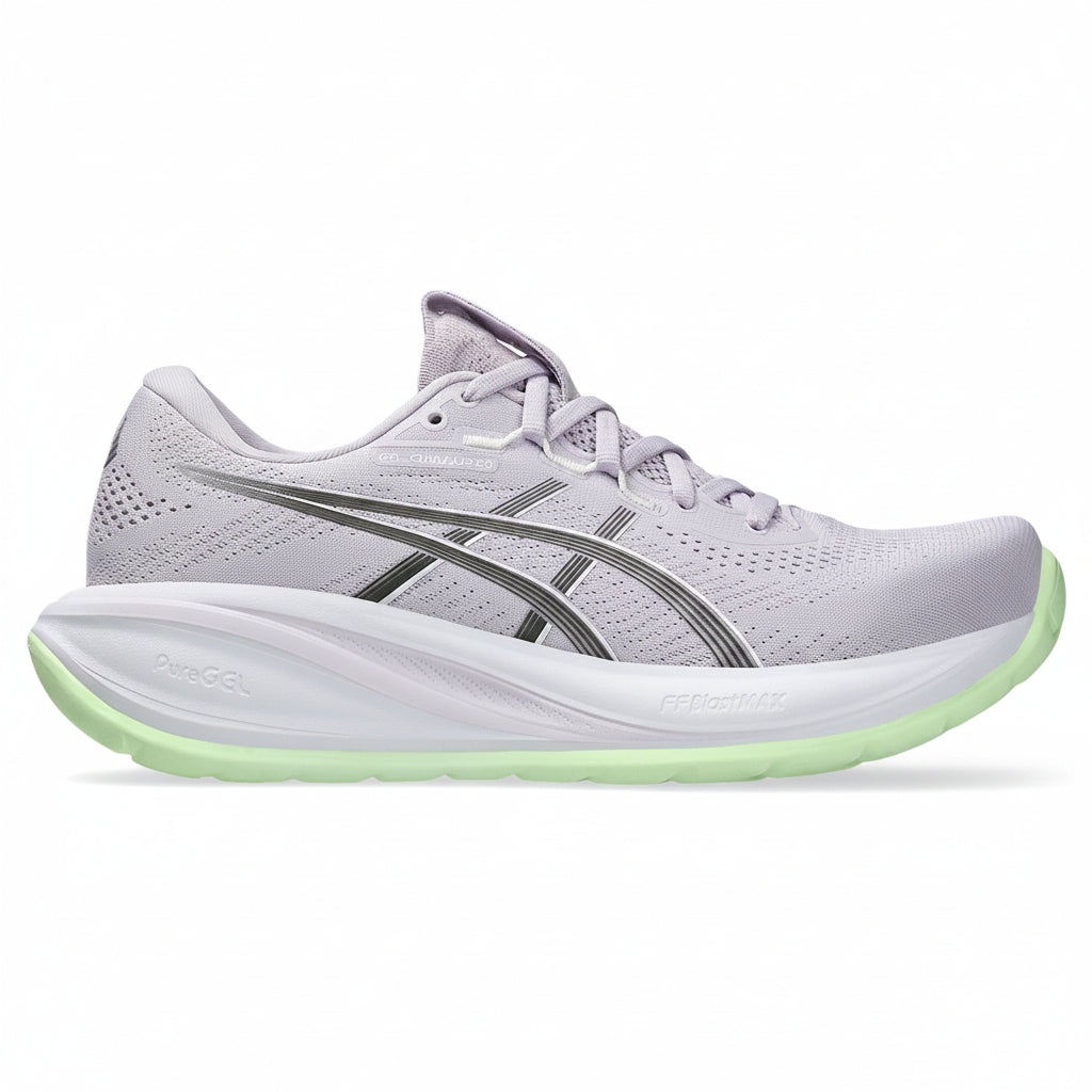 Light gray running shoe with green sole on a white background