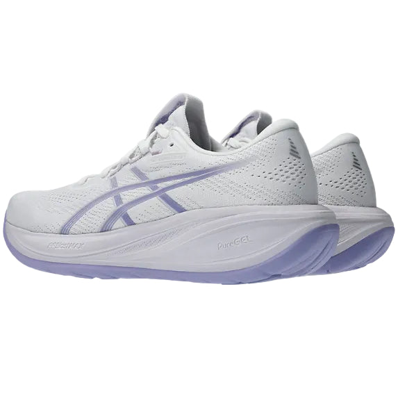 White running shoes with purple accents on a white background