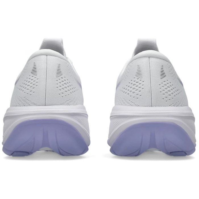 White running shoes with purple sole on a white background
