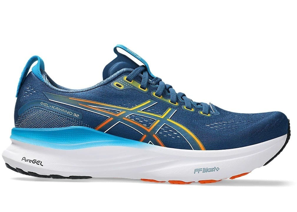 Blue running shoe with white sole on a white background