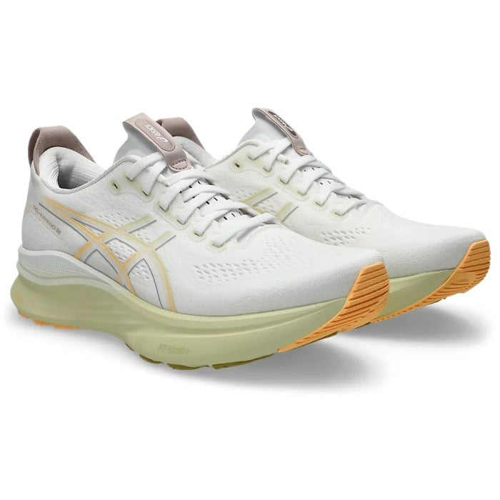 White running shoe with light brown sole on a white background