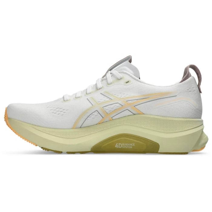 White running shoe with yellow sole on a white background