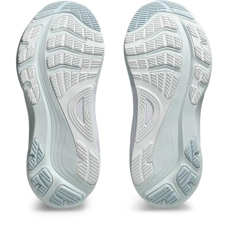 Close-up of the sole pattern of a pair of shoes on a white background