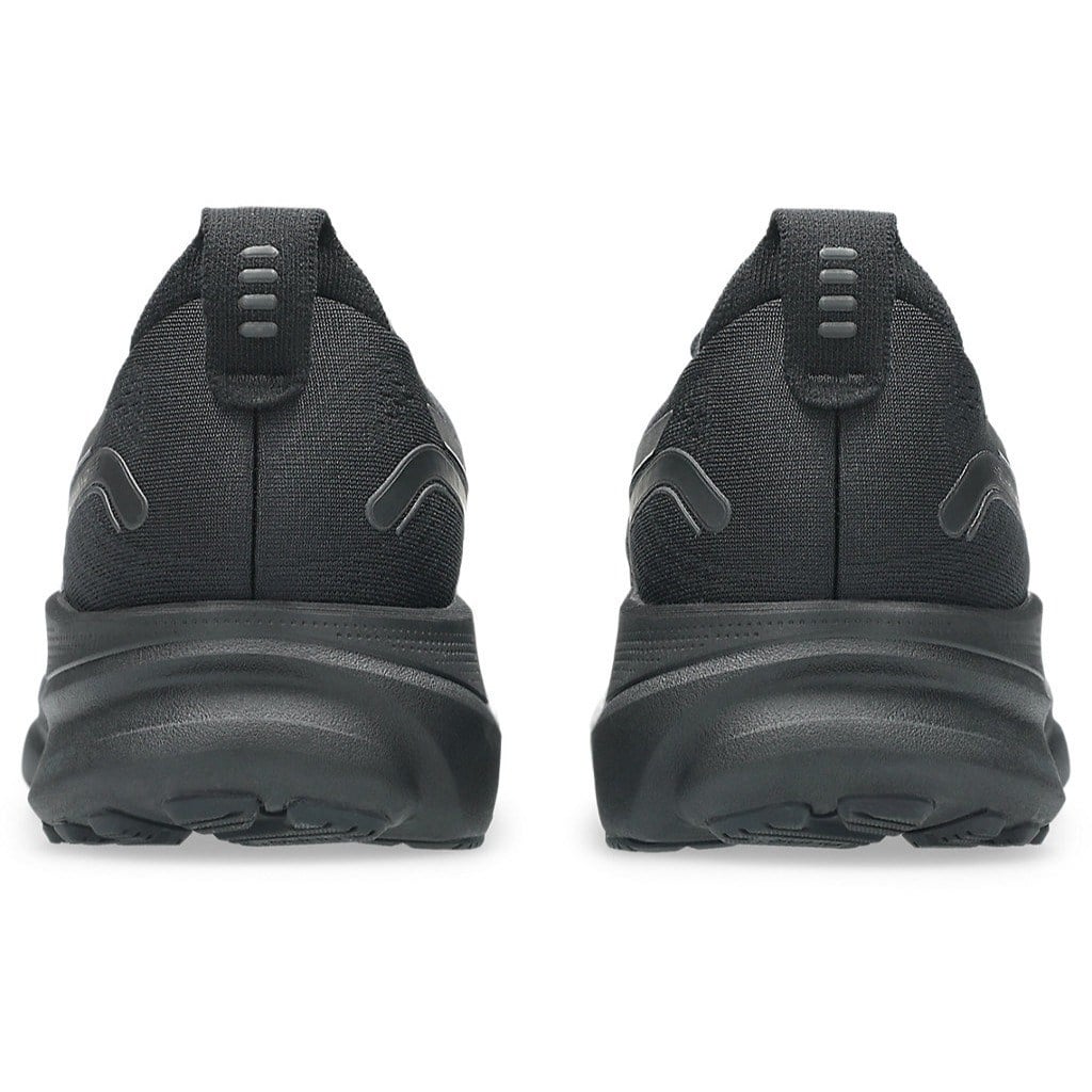 Black athletic shoes with sole pattern on a white background