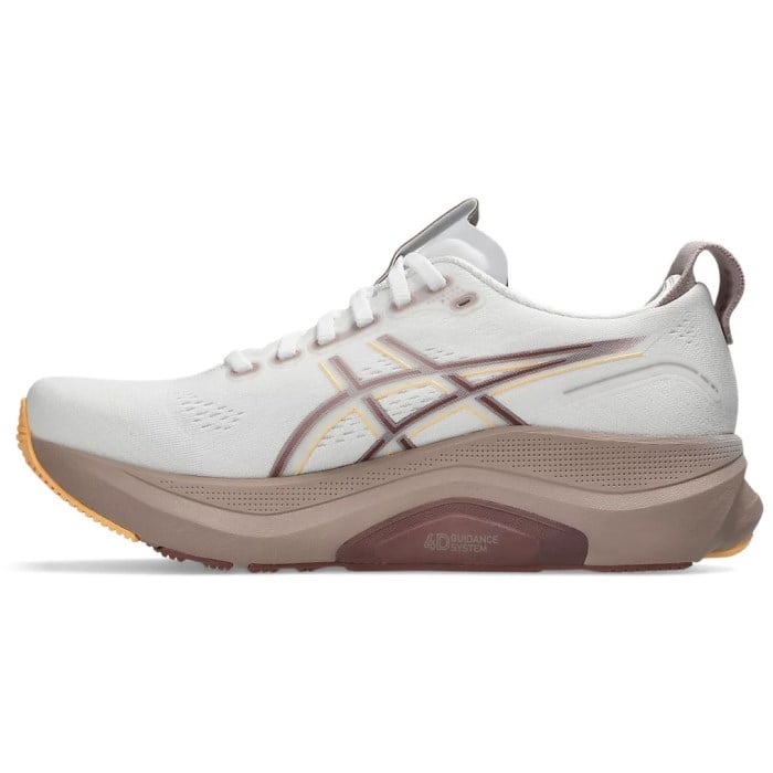 White running shoe with brown sole on a white background