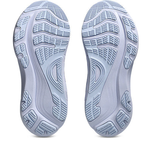 Close-up of the sole of a shoe with tread pattern on a white background