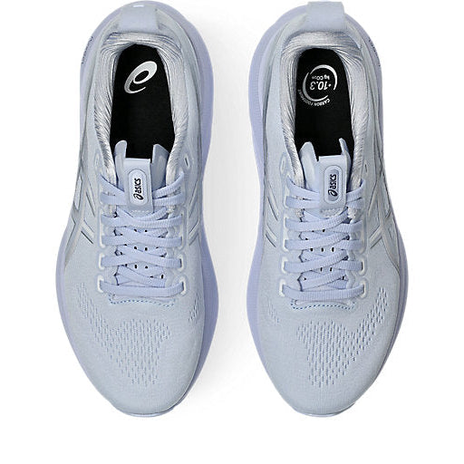 Pair of light blue running shoes with Asics logo on a white background