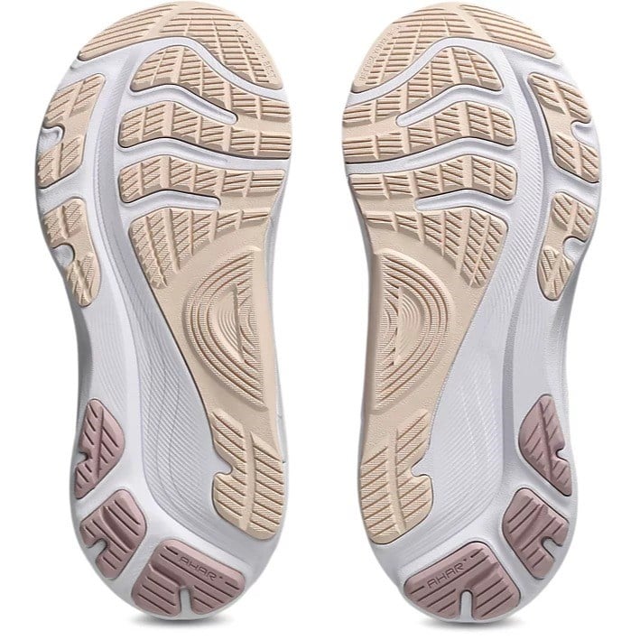Close-up of the sole of a shoe with a textured design on a white background
