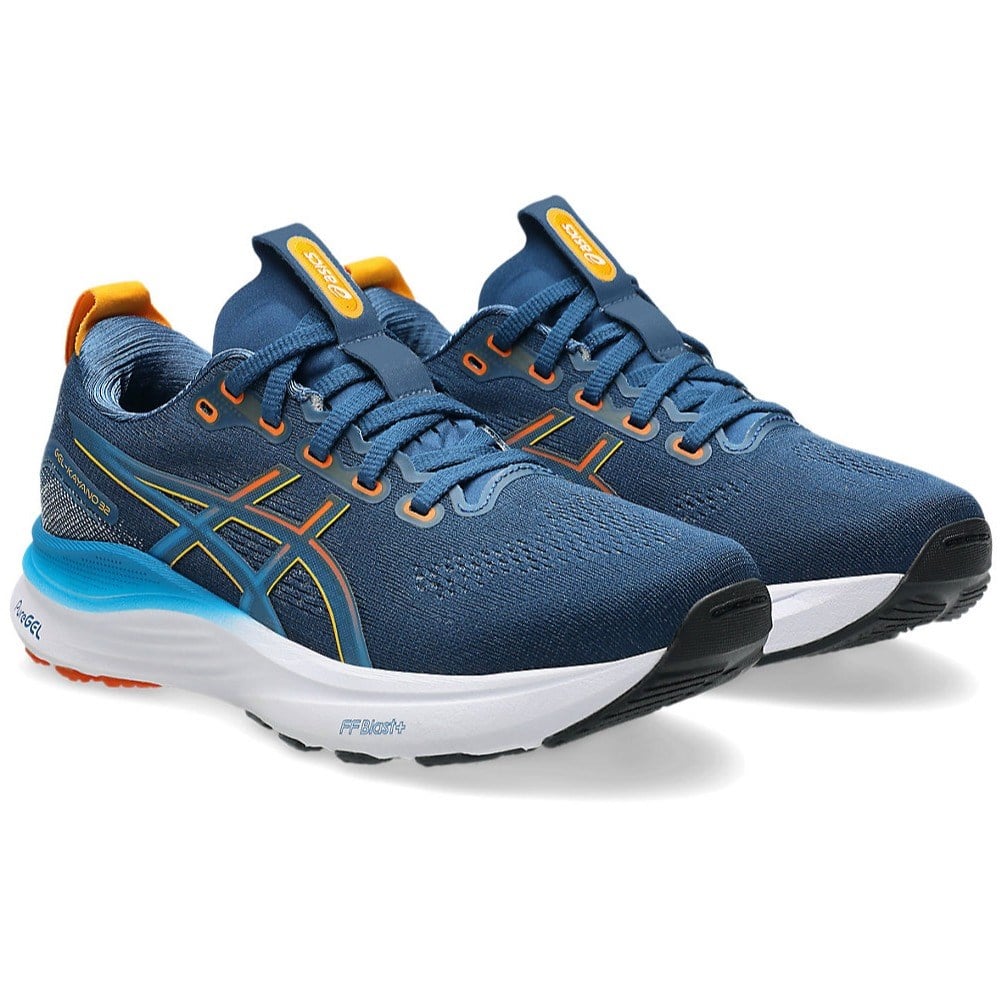 Blue running shoes with orange accents on a white background