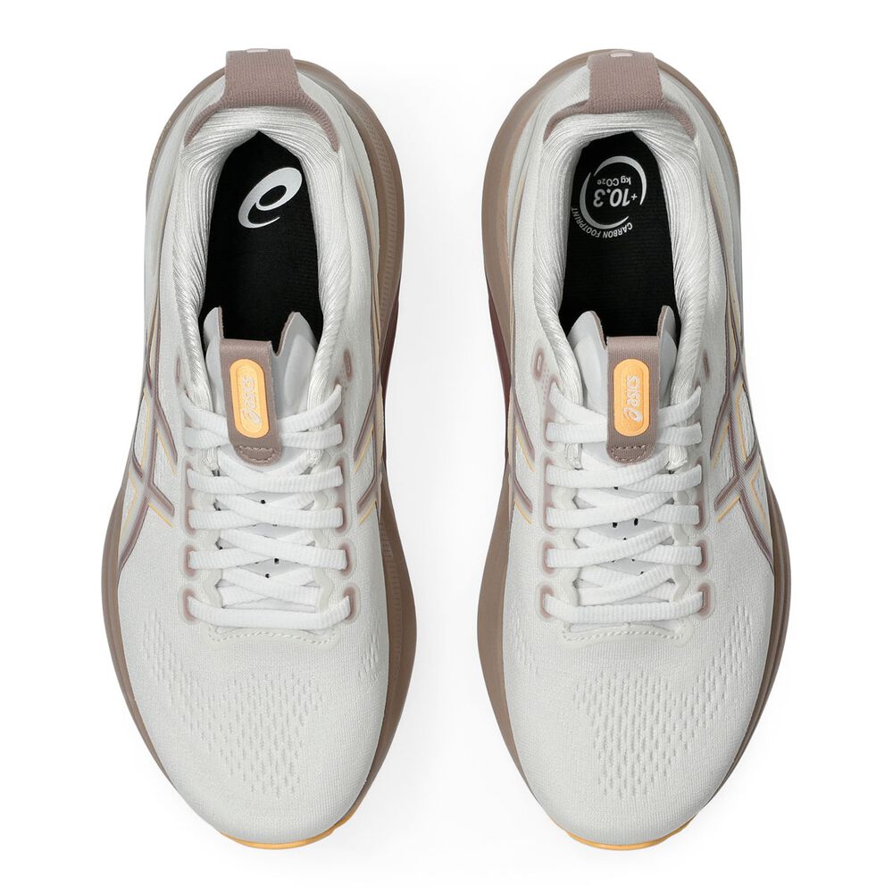 White running shoes with brown accents on a white background