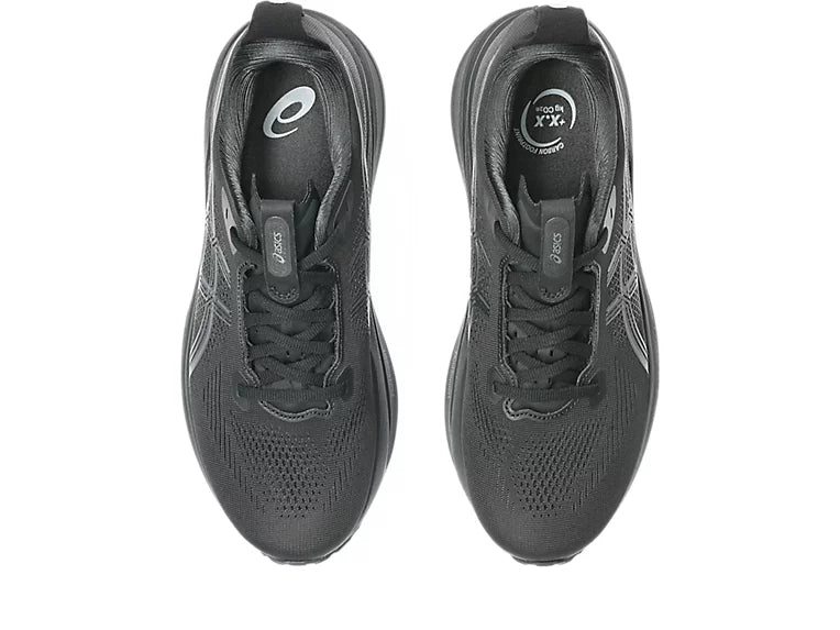 A pair of black Asics running shoes shown from a top-down view against a plain white background.