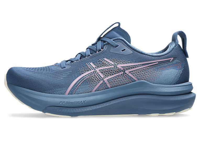 Blue running shoe with pink accents on a white background