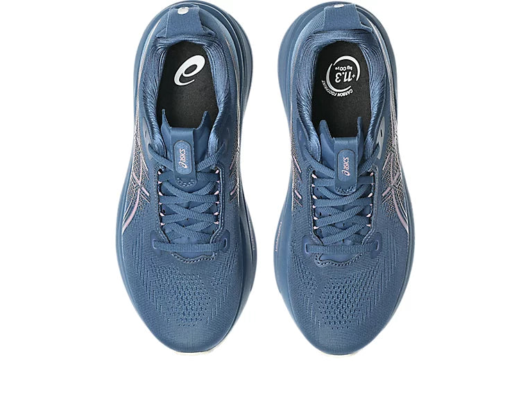 Pair of blue running shoes on a white background