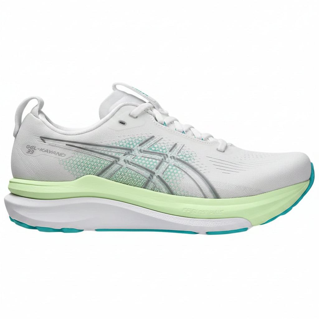 White running shoe with green sole on a white background