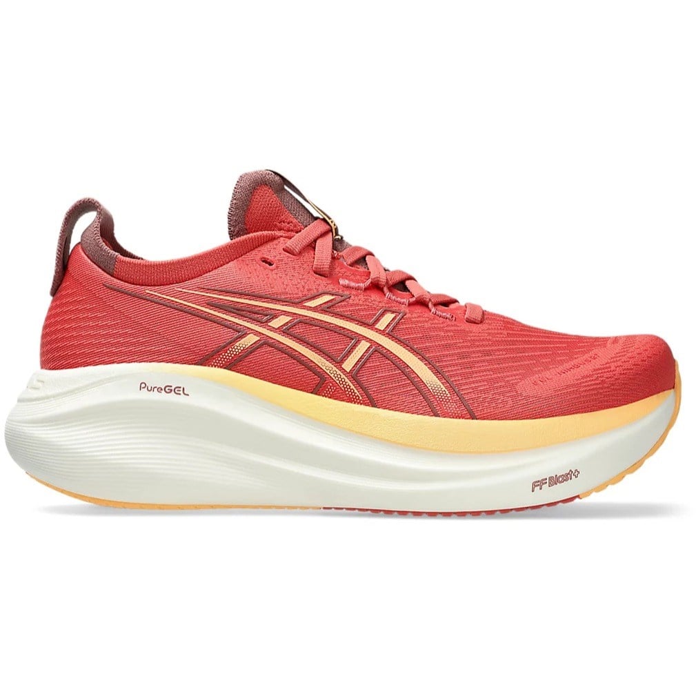 Red running shoe with a white sole on a white background