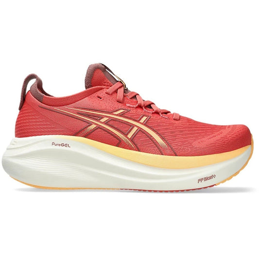 Red running shoe with a white sole on a white background