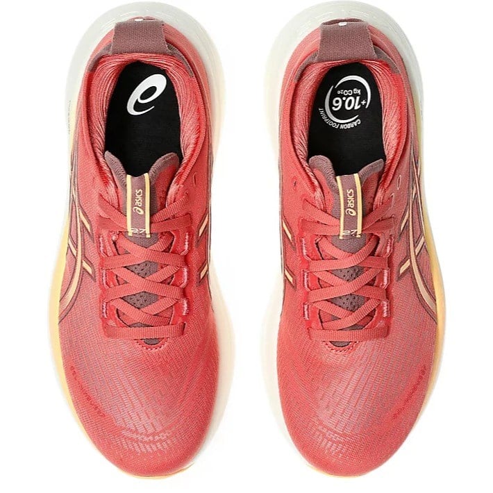 Red running shoes with visible Asics branding on a white background