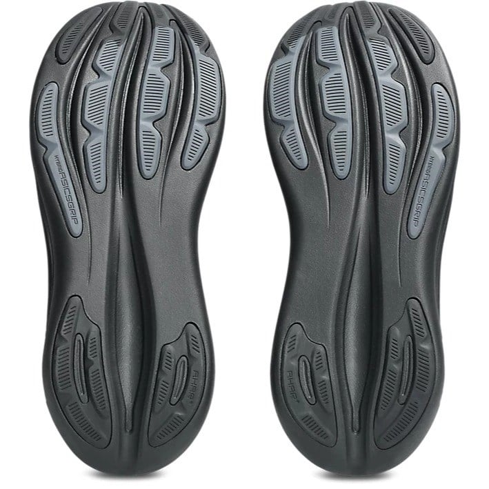 Black shoe sole with tread pattern on a white background