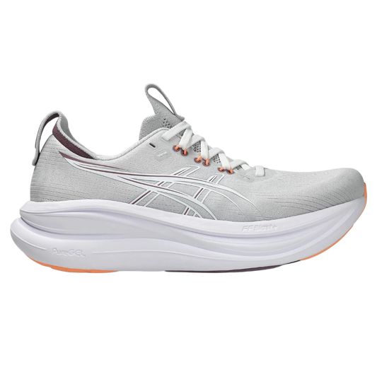 Gray running shoe with white sole on a white background
