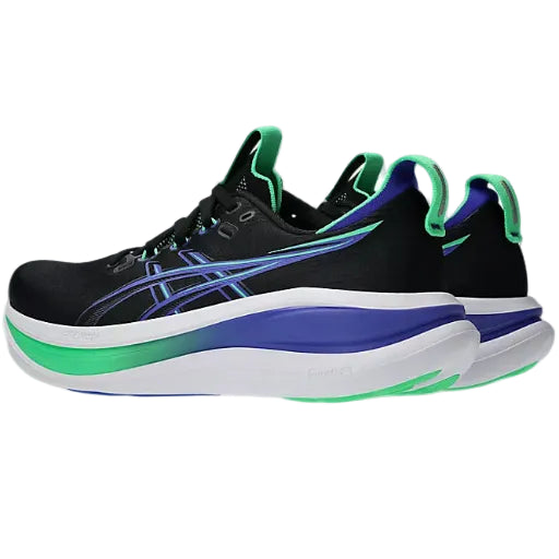 Black athletic shoe with blue and green accents on a white background