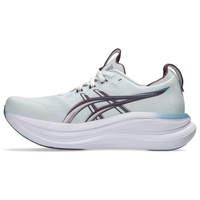 Light blue running shoe with a white sole on a white background