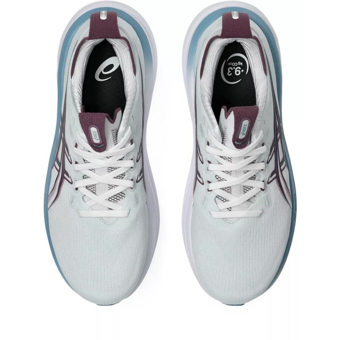 White running shoes with maroon accents on a white background