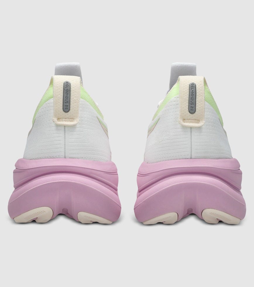 Pair of pastel-colored sneakers with a white background