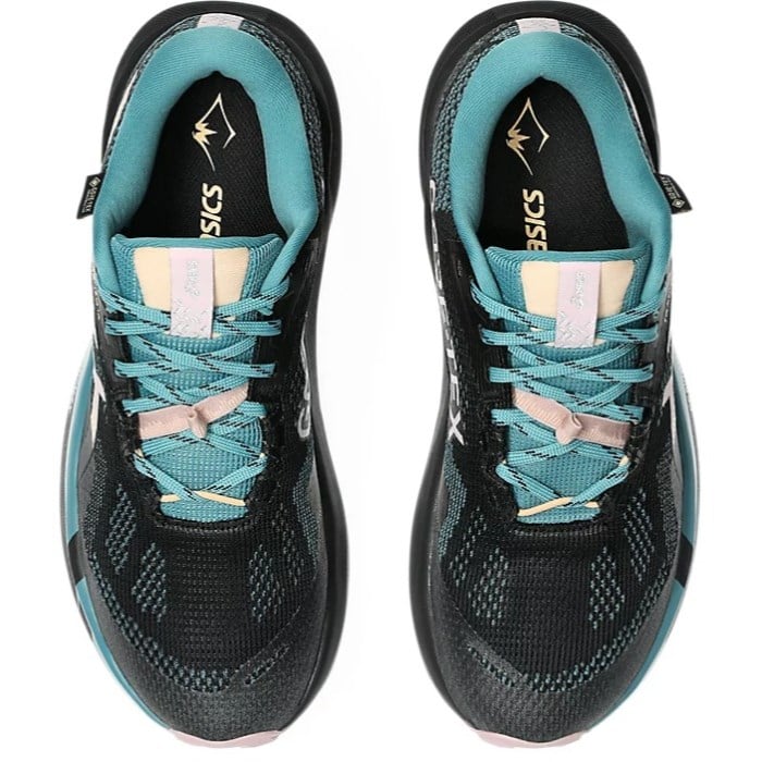 Pair of black and teal running shoes with 'Onitsuka' branding on a white background