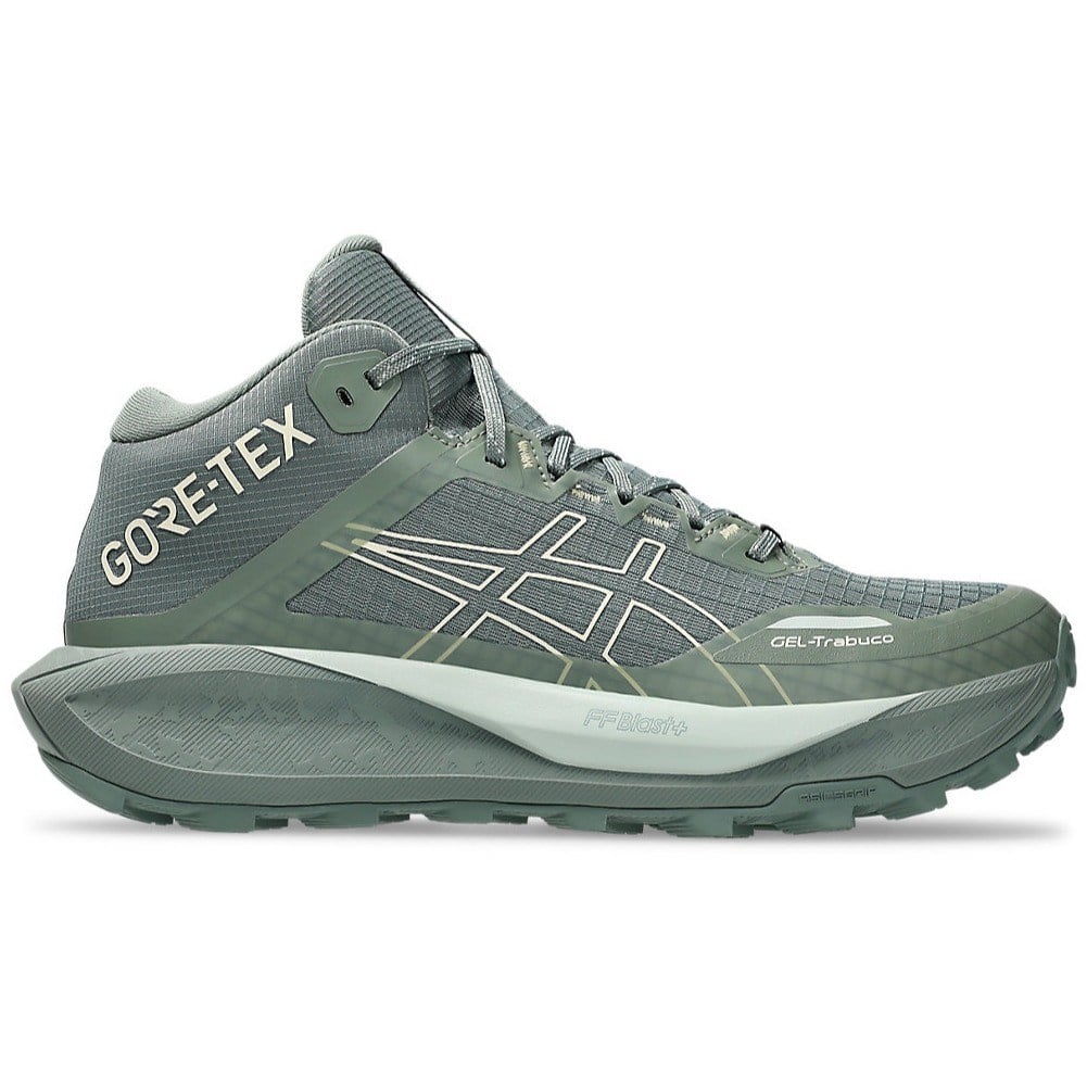 Green running shoe with Gore-Tex branding on a white background