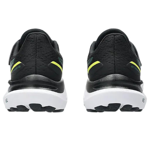 Black running shoes with white soles and yellow accents on a white background
