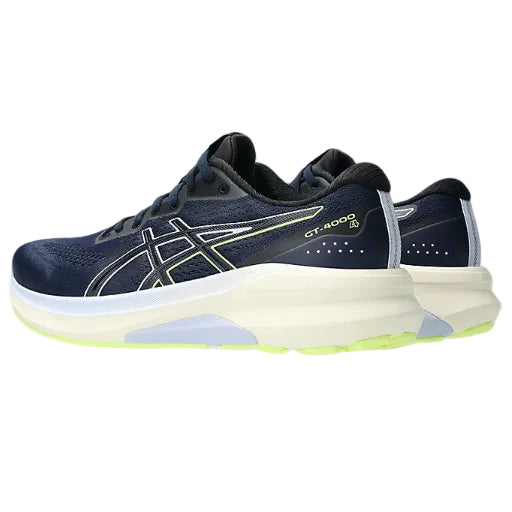 Navy running shoe with white sole on a white background
