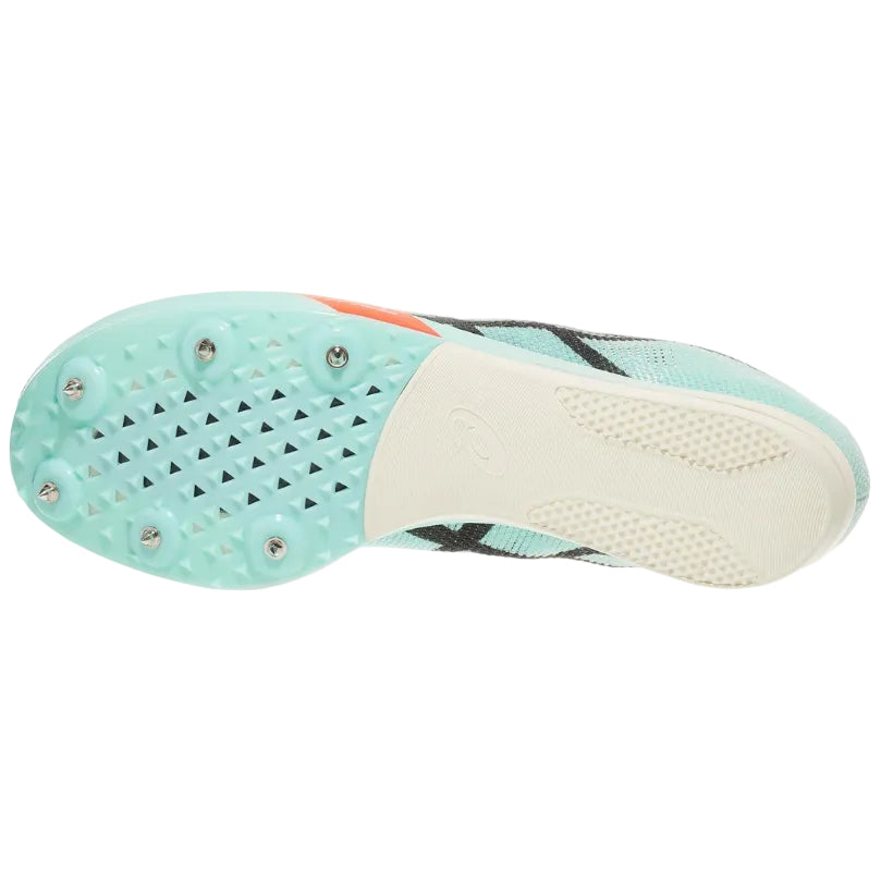 Close-up of a running shoe sole with textured pattern and small studs on a white background