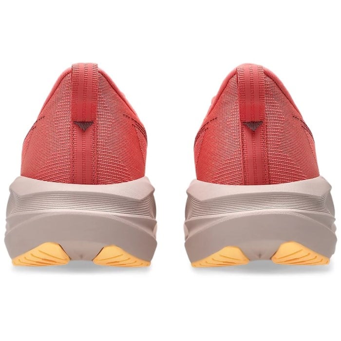 Red shoes with beige soles on a white background