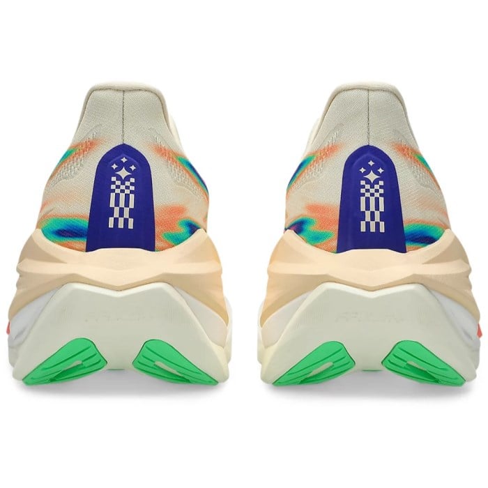 Pair of beige sneakers with colorful sole and brand logo on a white background