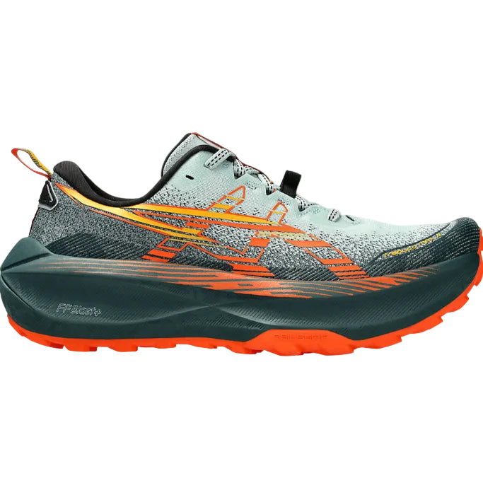 Asics Trabuco Max 4 trail running shoe with a green and orange color scheme, featuring a trail-specific design and cushioning technology.