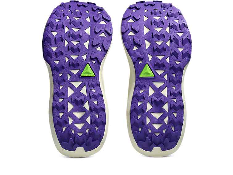 A pair of shoe soles shown from the bottom, featuring a purple geometric tread pattern with a small bright green triangular logo on each side and a white edge.