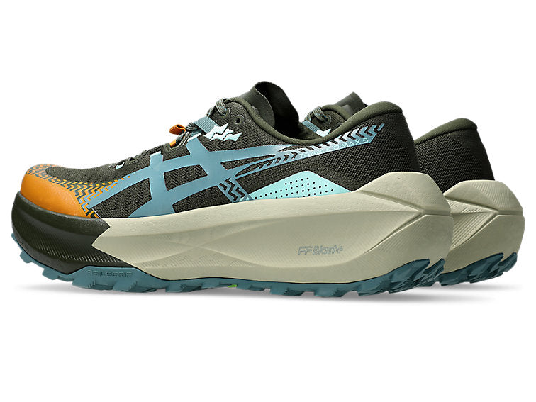 A pair of ASICS trail running shoes in black, gray, and light blue with a bright orange toe cap and a beige midsole, shown against a plain white background.