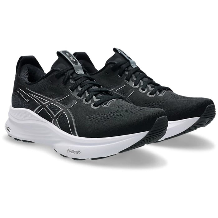 Black running shoes with white sole on a white background