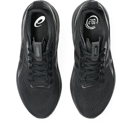 Black running shoes with visible Asics logo on a white background