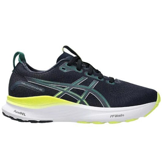 Navy running shoe with green accents on a white background