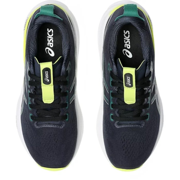 Black running shoes with green and yellow accents on a white background
