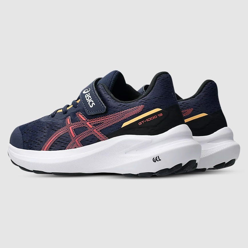 Navy and white running shoe with red accents on a light gray background