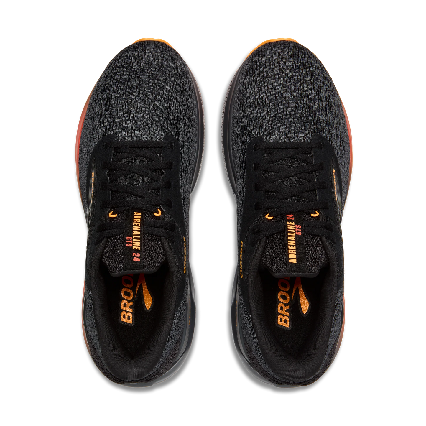 Black running shoes with orange accents on a white background