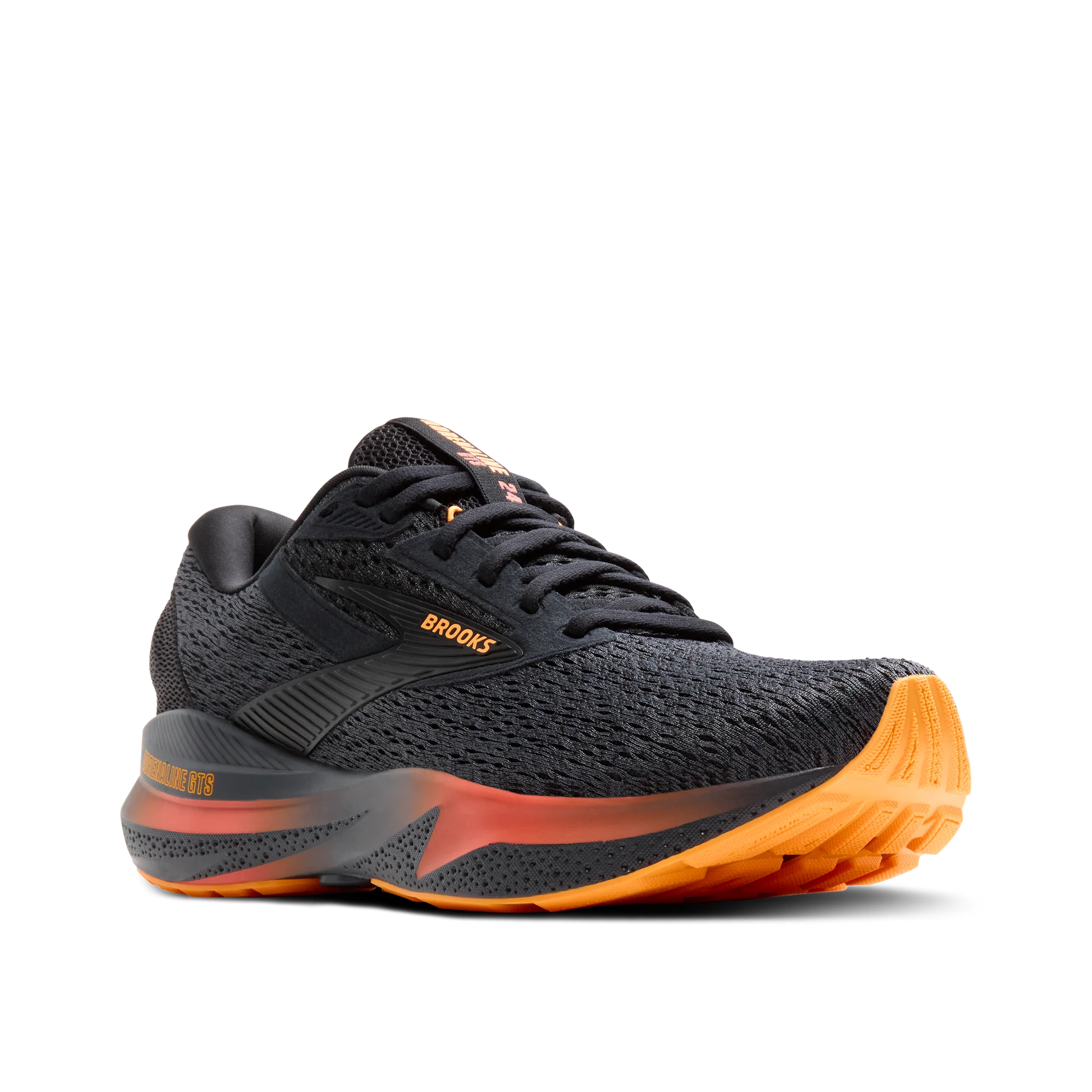 Black running shoe with orange sole on a white background