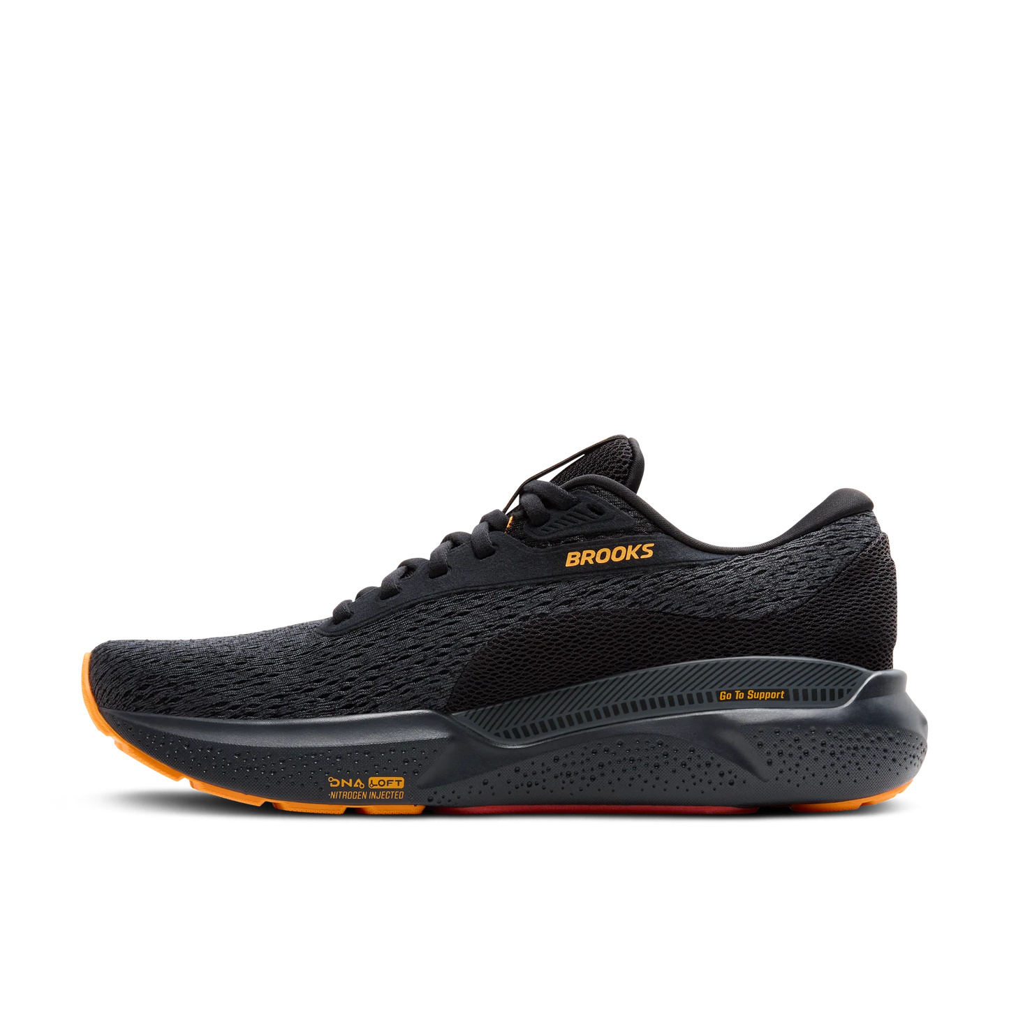 Black running shoe with orange sole on a white background