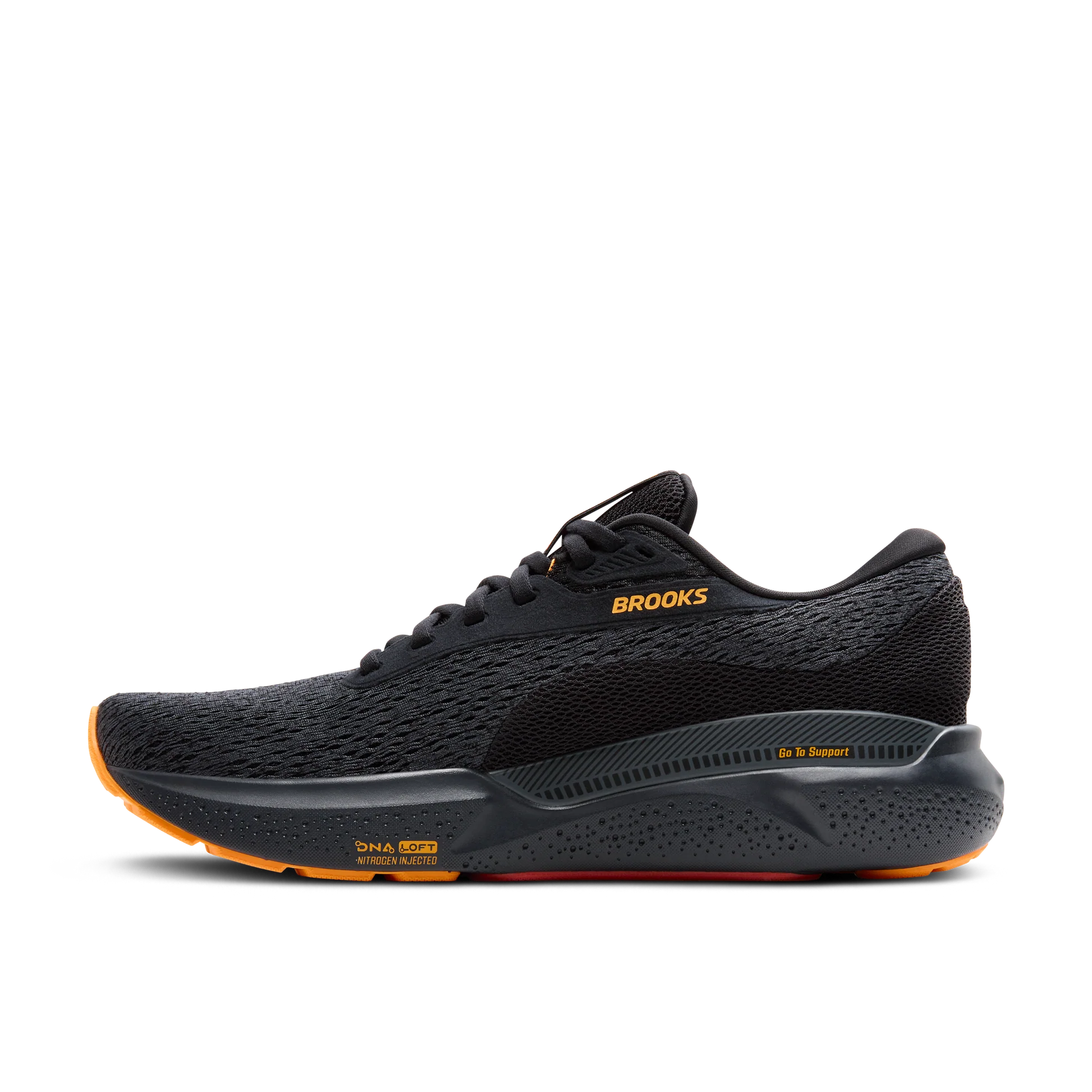 Black running shoe with orange sole on a white background